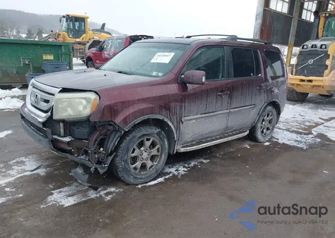 2009 Honda Pilot Touring z USA, uszkodzony, nr VIN 5FNYF48999B006521